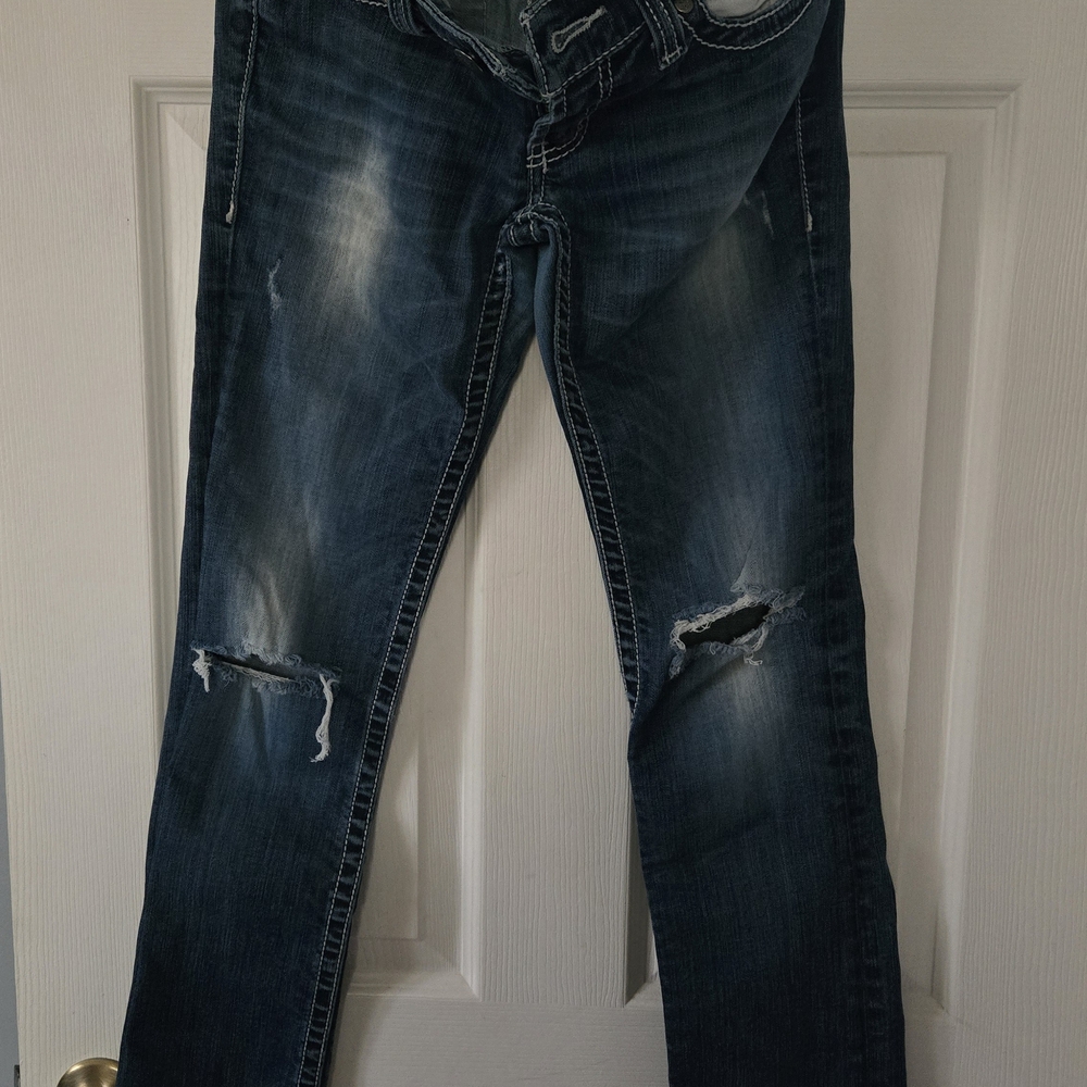 Distressed Blue Jeans